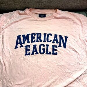 American Eagle men’s large pink colored w/navy stitched letters-100% cotton T